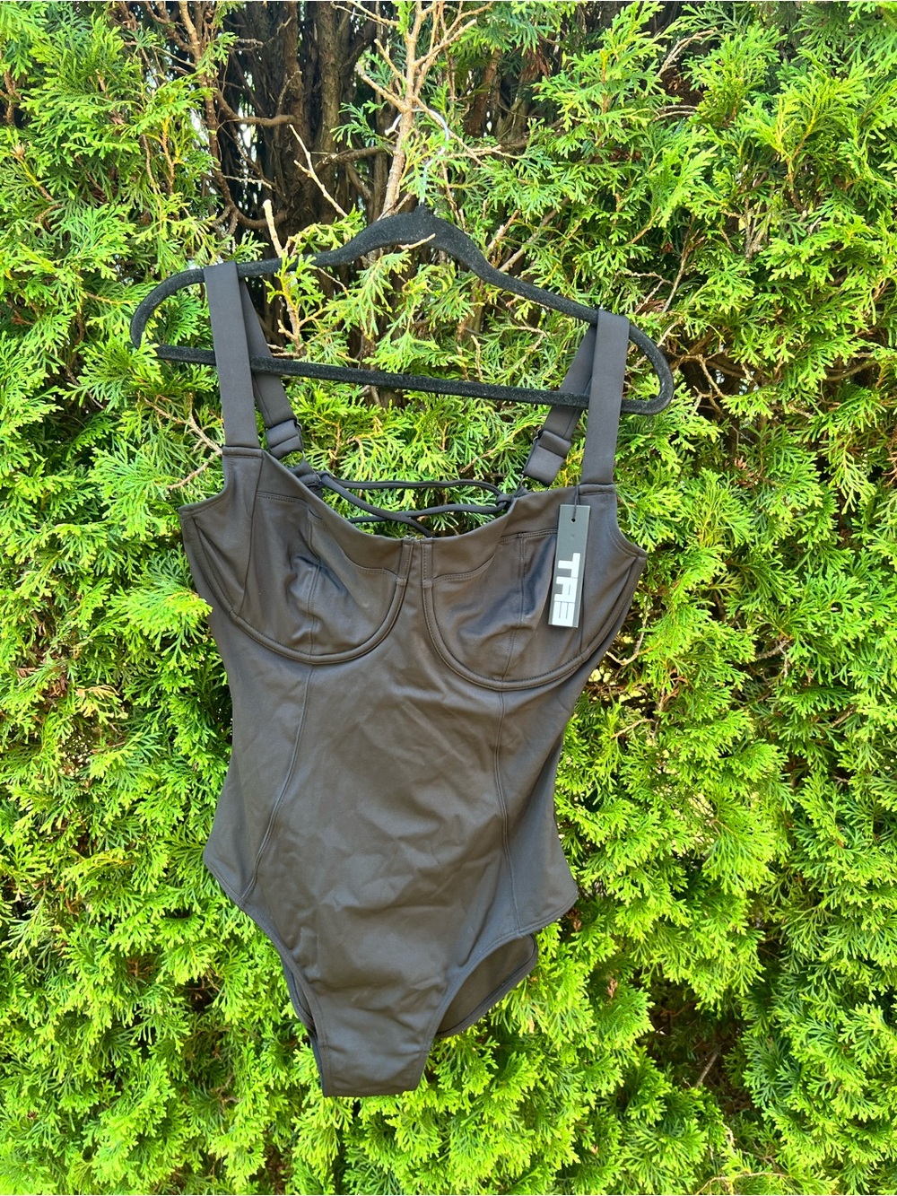 Black Structured One-Piece Bodysuit